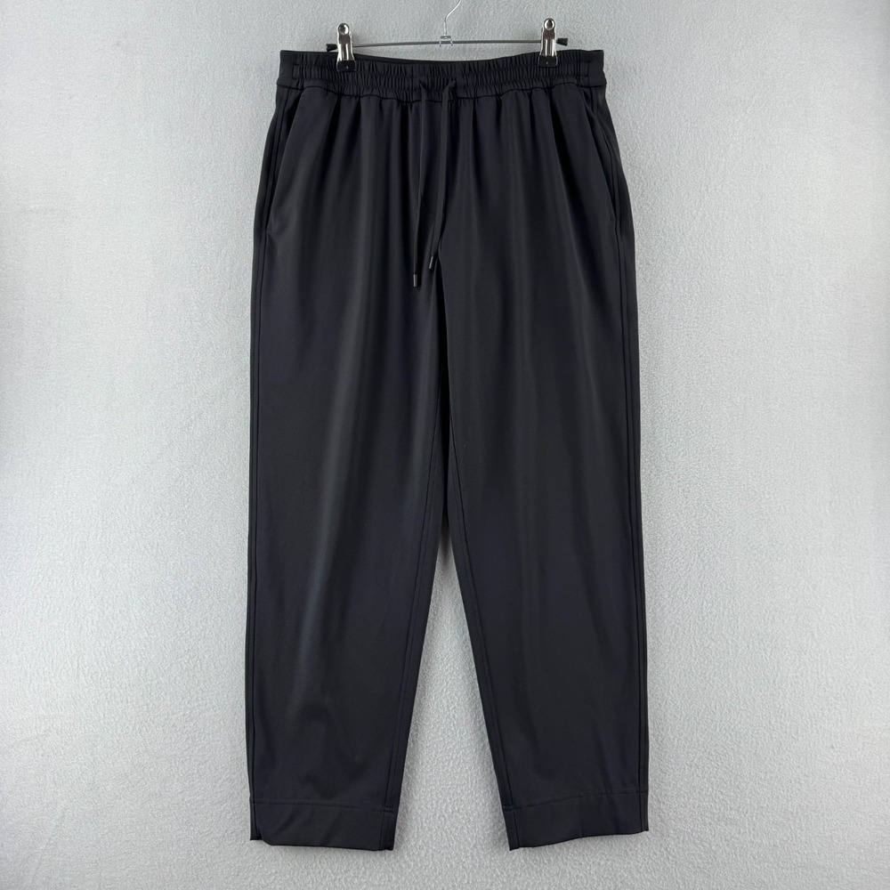Lululemon Tapered Leg Mid‎ Rise Pants Womens Medium Black Stretch Yoga Casual